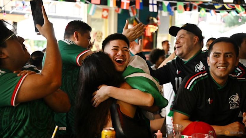 Mexicans celebrate breaking opening day curse with 2-0 win
