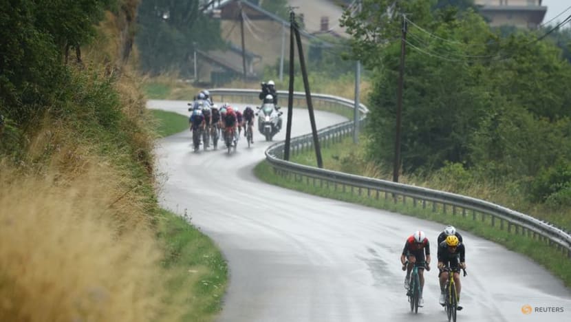 Tour de France final stage neutralised after slippery road conditions