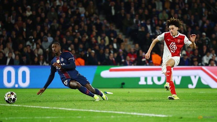 PSG see off late Monaco surge to advance in Champions League