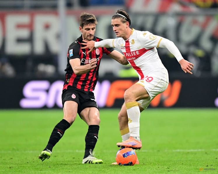 Milan salvage unbeaten run in dramatic draw with Genoa