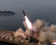 North Korean leader Kim oversaw test of missiles with cluster warheads