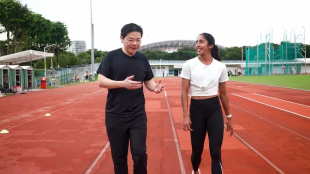 我国女飞人珊蒂与副总理黄循财分享 她如何从失败中站起来