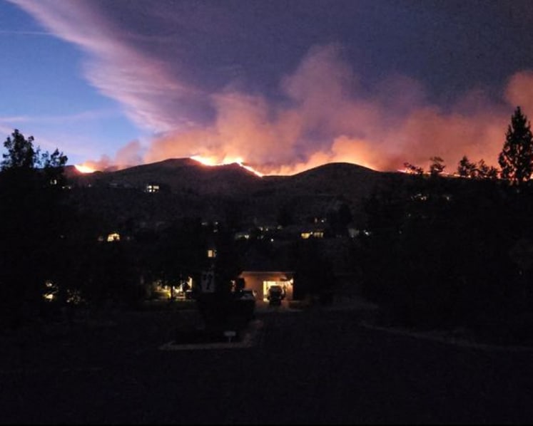 Tens of thousands evacuated as fire bears down on US city