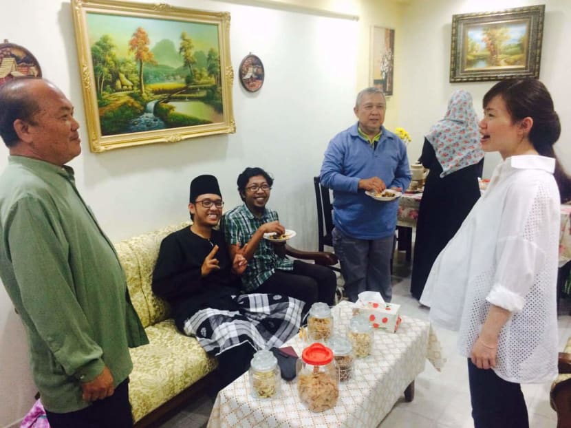 MP Tin Pei Ling meeting (far right) meeting residents. Ms Tin said there has been no indication she would not be fielded. Photo: Tin Pei Ling