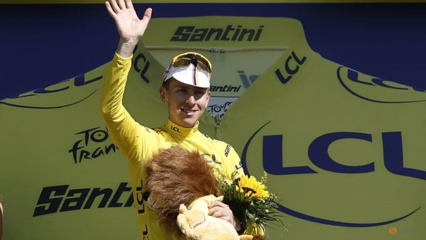 Leader Pogacar keeps ear on partner's progress in middle of Tour stage