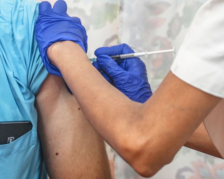 Explainer: Why a person fully vaccinated against Covid-19 can still get infected and what it means