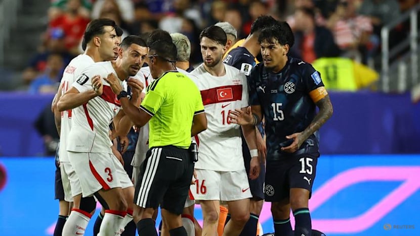 Paraguay's Almiron sent off for covering his mouth with his hand against Turkey