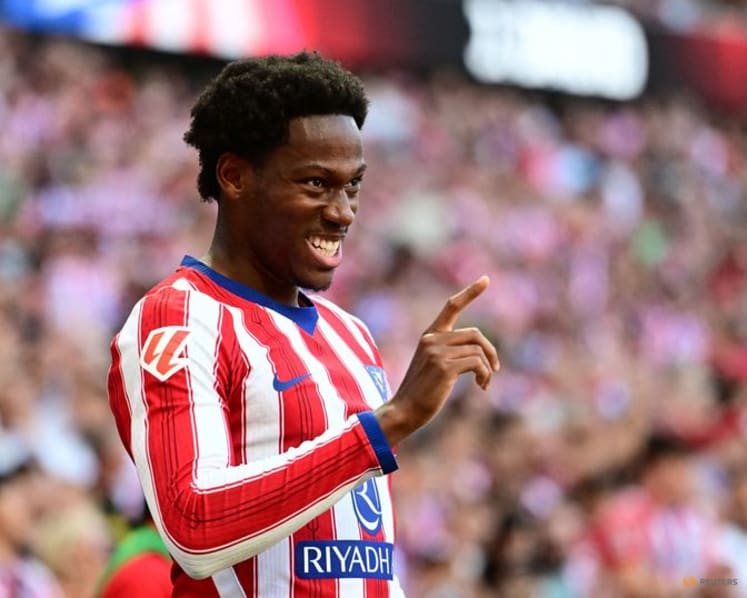 Atletico ride derby storm to beat 10-man Real Madrid 2-1