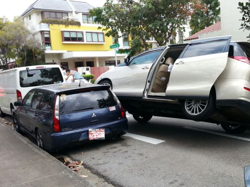 Accident at Chuan Drive causes MPV to tilt