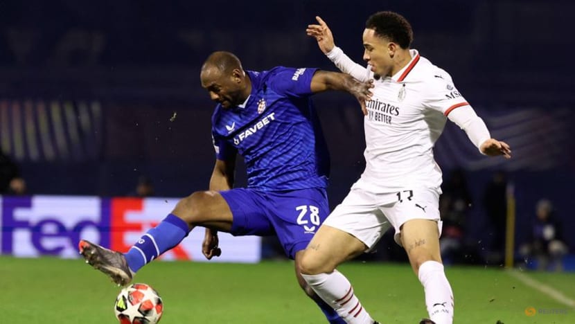 Ten-man Milan settle for playoff spot after Dinamo loss