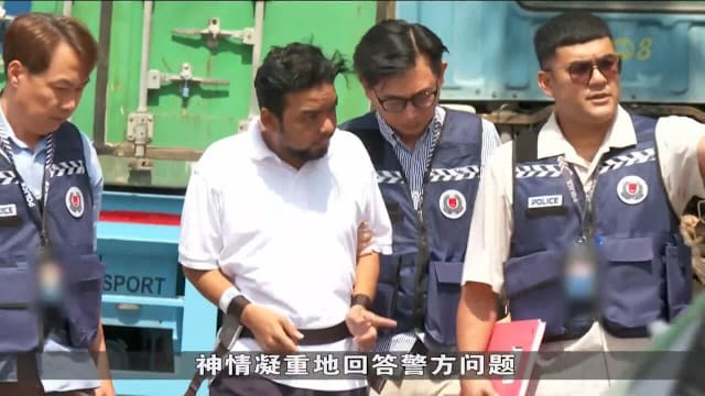  马国男子和两人涉偷窃宝马轿车 被押返现场重组案情
