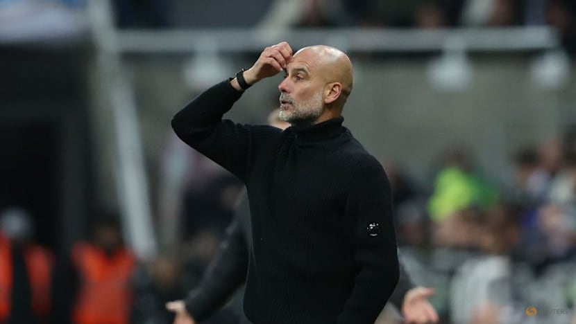 Man City's Guardiola apologises for confrontation with cameraman