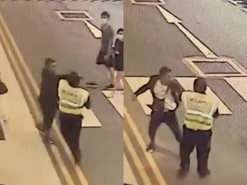 In a closed-circuit television footage shared by Security Association Singapore, a man who appears not to have a mask on is shown hitting security guard Sures Perimal. In a closed-circuit television footage shared by Security Association Singapore, a man who appears not to have a mask on is shown hitting security guard Sures Perimal.