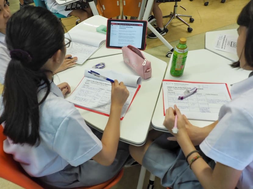 Secondary school students in a classroom in Singapore.