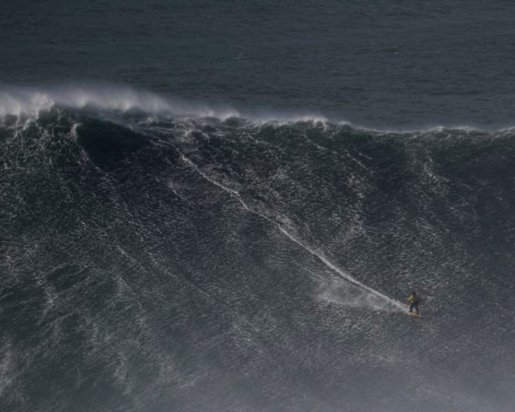 Surfing-Dupont, Chianca claim big wave titles in giant Nazare surf
