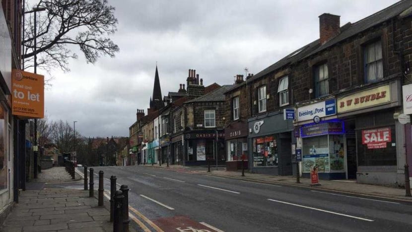 ‘It’s like a ghost town’: Some Singaporeans stay put in locked-down UK as shops close, hospitals prepare for more cases