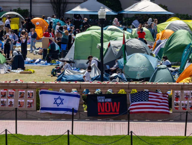 Posters and flags honoring Israeli hostages kidnapped on Oct 7 are displayed on a ledge near the pro-Palestine encampment at Columbia University on April 24, 2024 in New York City. 
