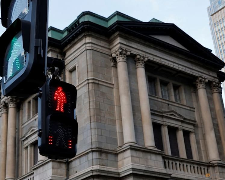 Investors react to BOJ's decision to hold rates
