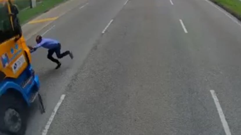 Pedestrian, 33, taken to hospital after trailer truck hits him in Tuas