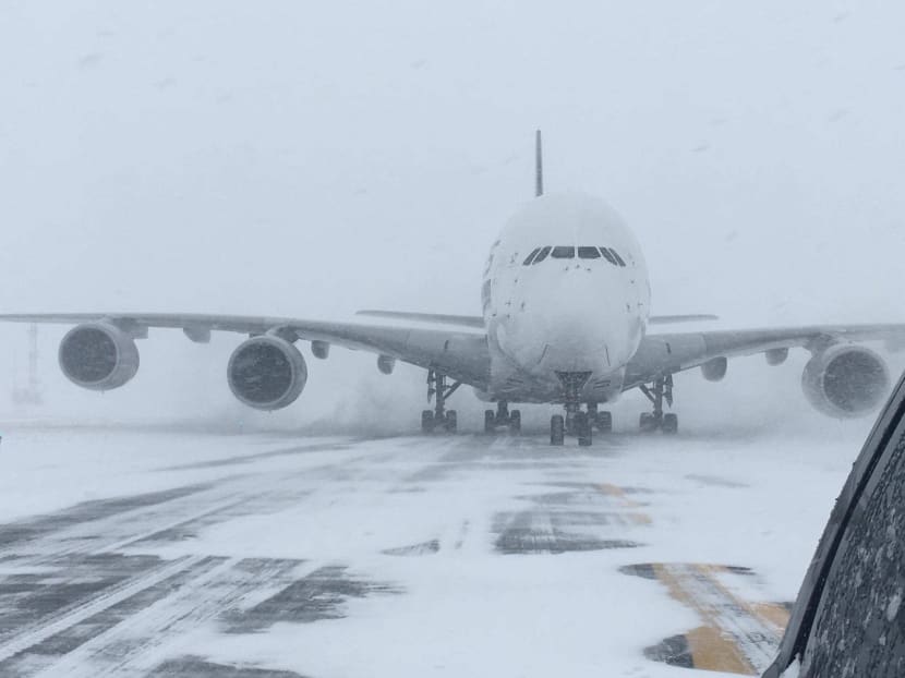 Singapore Airlines Flight SQ26 is seen sitting on the snow-covered tarmac of Stewart International Airport on Jan 4, 2018. Photo: Stewart International Airport
