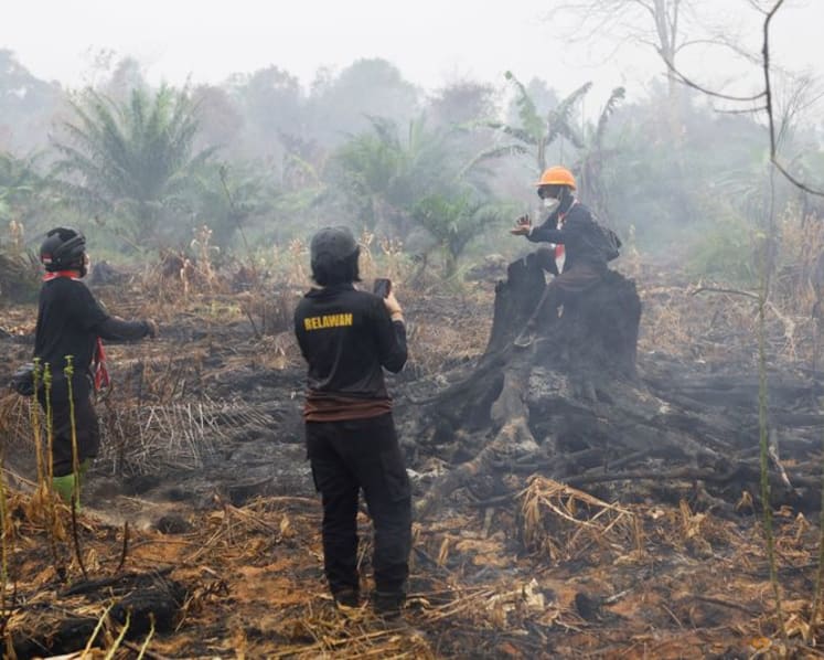 Indonesia's wildfires may last until early November, minister says