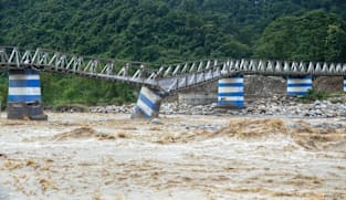 Heavy rains trigger floods, landslides killing scores in India's Darjeeling, Nepal
