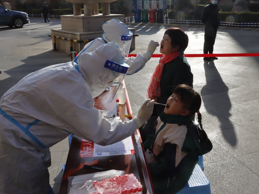 Authorities have been racing to contain virus infections via mass testing of residents and targeted lockdowns, as the outbreak spreads to eleven provinces.