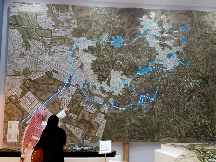Saudi architect Usamah Shehatah, director of Slum Areas Development Department, points at a map in the offices of the Jiddah Development and Urban Regeneration Company in Jiddah, Saudi Arabia. Photo: AP