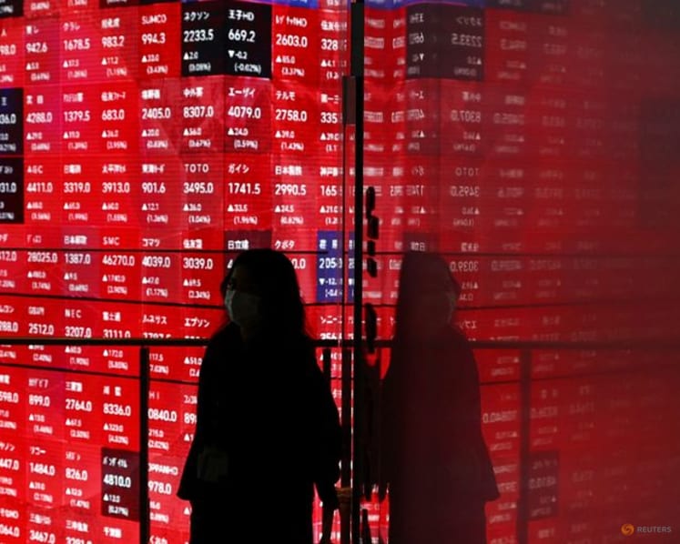 US stocks close below record highs, world indexes set for double-digit 2025 gains