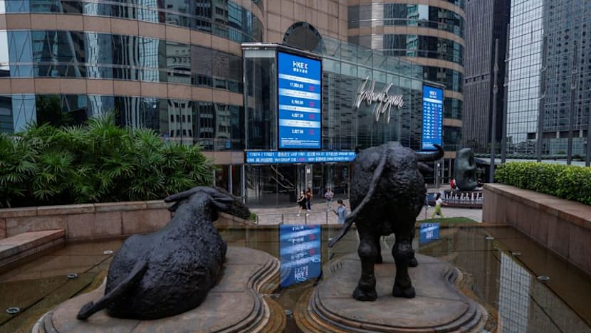 Asian stocks skid, Wall Street and bonds aided by oil slip