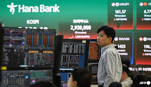 Asian stocks fluctuate after Wall Street sell-off, crude holds losses on peace talks