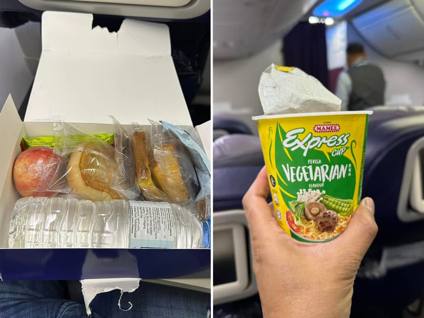 A disgruntled Malaysia Airlines passenger showing photos of the food he was served in business class during a flight from Indonesia to Malaysia.