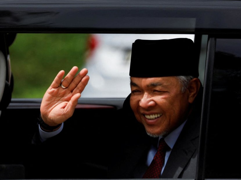 Barisan Nasional President Ahmad Zahid Hamidi waves at photographers as he leaves the National Palace at Kuala Lumpur, Malaysia on Nov 23, 2022. Barisan Nasional President Ahmad Zahid Hamidi waves at photographers as he leaves the National Palace at Kuala Lumpur, Malaysia on Nov 23, 2022.