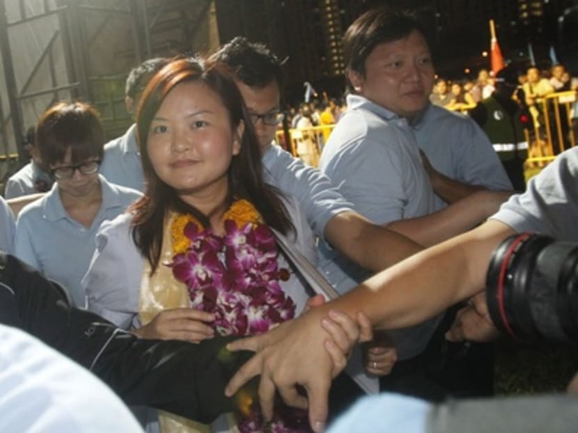 Punggol East by-election: Workers Party Rally at Rivervale Cresent / Lee Li Lian bring escorted after the rally..Photo: Ernest Chua. 19 Jan 2013.