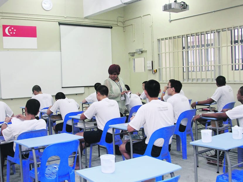 Student inmates in a lesson at the prison school at Tanah Merah Prison on Mar 27 2012. Photo: OOI BOON KEONG.