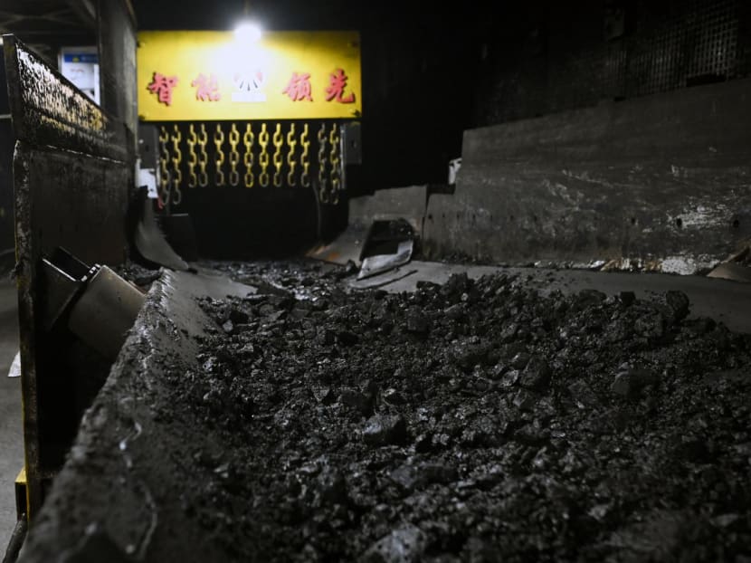 This photo taken on April 26, 2023 shows mined coal on a conveyor belt while underground at the Xiaobaodang coal mine near Yulin, in China's northern Shaanxi province, during a media tour organised by Chinese telecoms giant Huawei. This photo taken on April 26, 2023 shows mined coal on a conveyor belt while underground at the Xiaobaodang coal mine near Yulin, in China's northern Shaanxi province, during a media tour organised by Chinese telecoms giant Huawei.