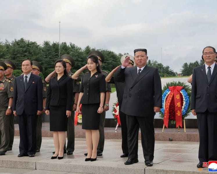 North Korea's Kim Jong Un marks war anniversary with daughter by his side