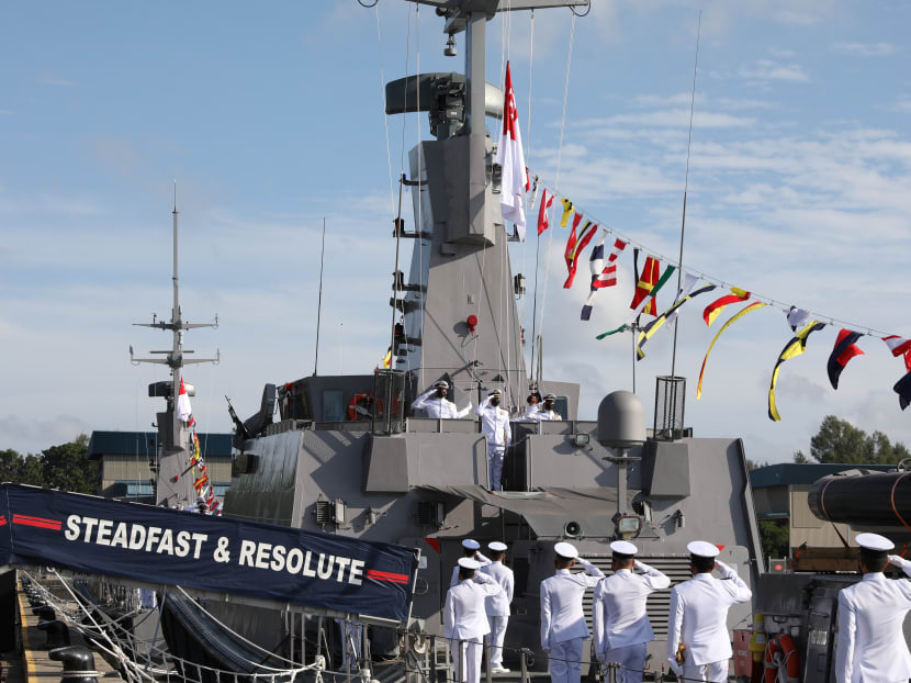 The crew of MSRV Guardian saluting as the naval ensign is raised. The vessel, together with sister ship MSRV Sentinel, will be operational from Jan 26.