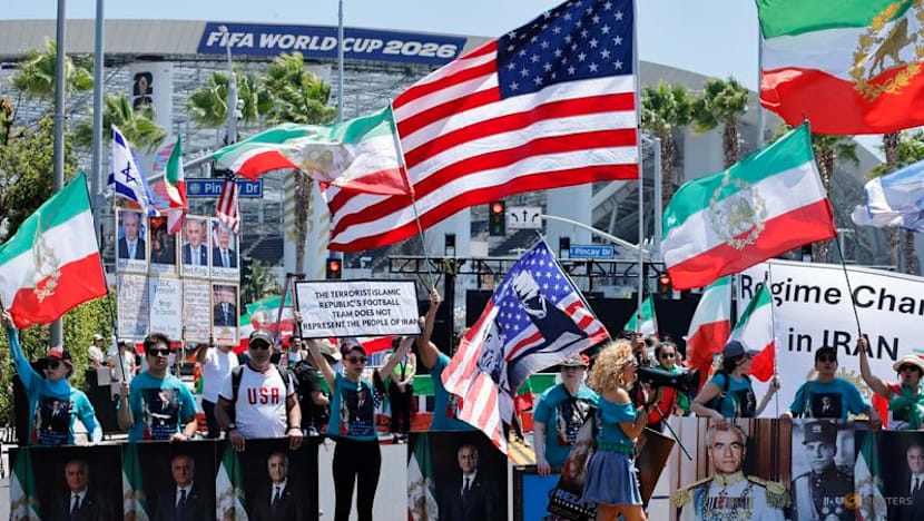 Iranian American protesters gather as soccer team prepare for World Cup opener