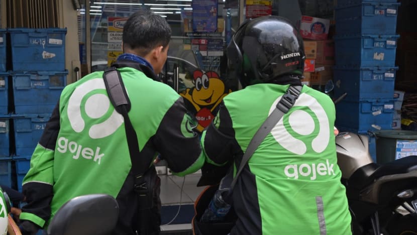 Singapore's competition watchdog looking into potential merger between Grab and Gojek