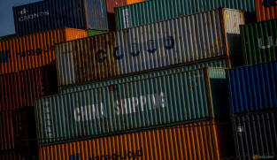 China's top leaders pledge economic support as trade war rages