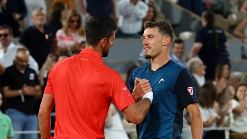 Djokovic eases into last-16 with 99th French Open win - CNA