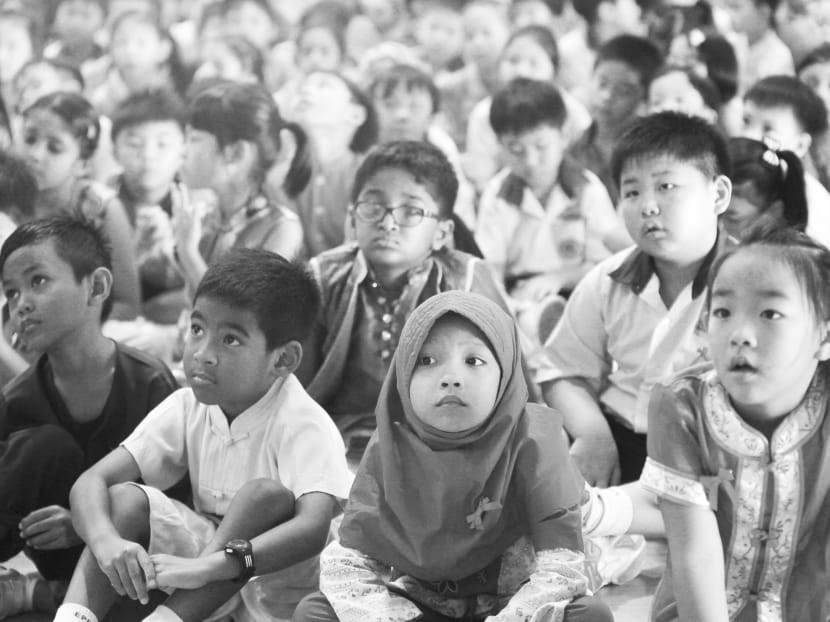 NUS sociologist Daniel Goh has critiqued school events such as Racial Harmony Day as offering an essentialist and superficial perception of racial distinctions. TODAY File Photo