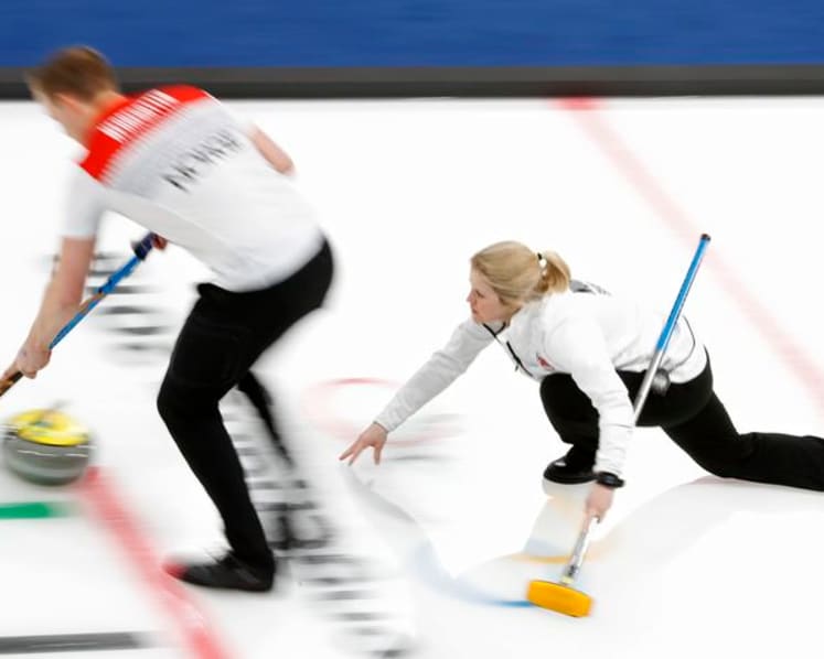 Curling-Married mixed doubles teams balance demands of competition with family life