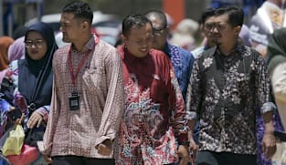 Malaysia’s work-from-home policy: Experts flag minimal fuel savings, businesses wary of economic fallout