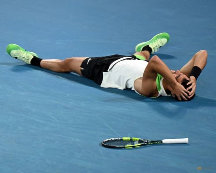 Alcaraz outlasts Djokovic to complete career Grand Slam