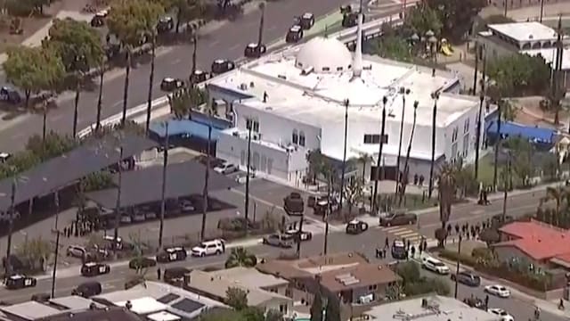 美国回教中心发生枪击案 三人死两枪手自尽