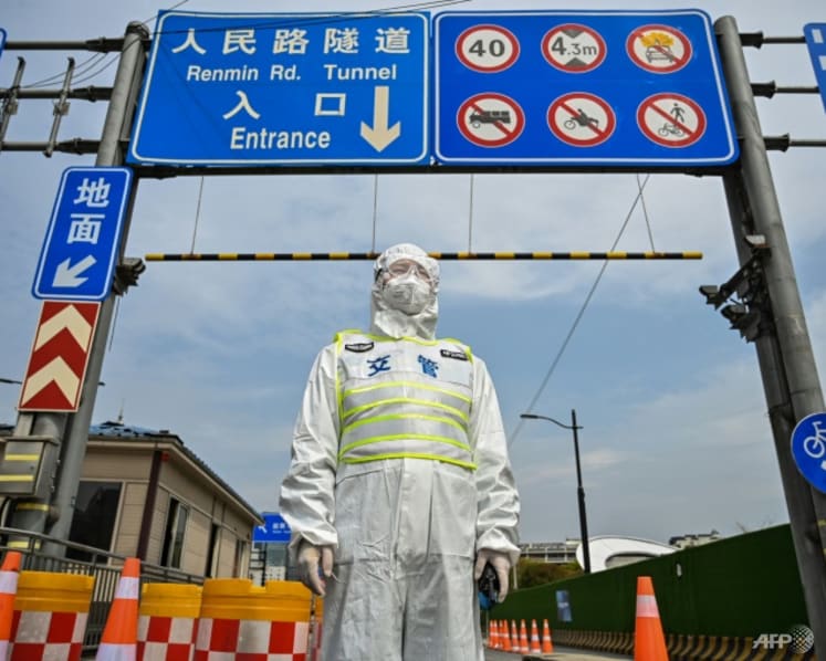 Commentary: Why China is more willing to test millions than trust vaccination