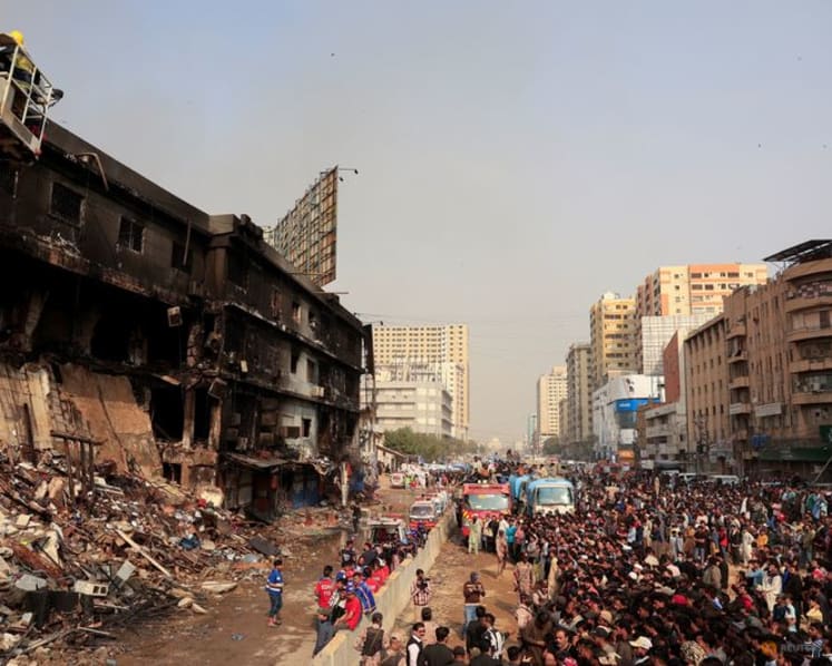 Karachi mall fire death toll rises to 23 as rescuers search for dozens missing