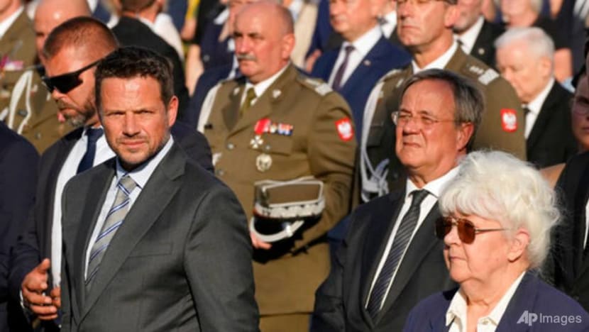 Germany's Laschet attends WWII revolt  observances in Poland